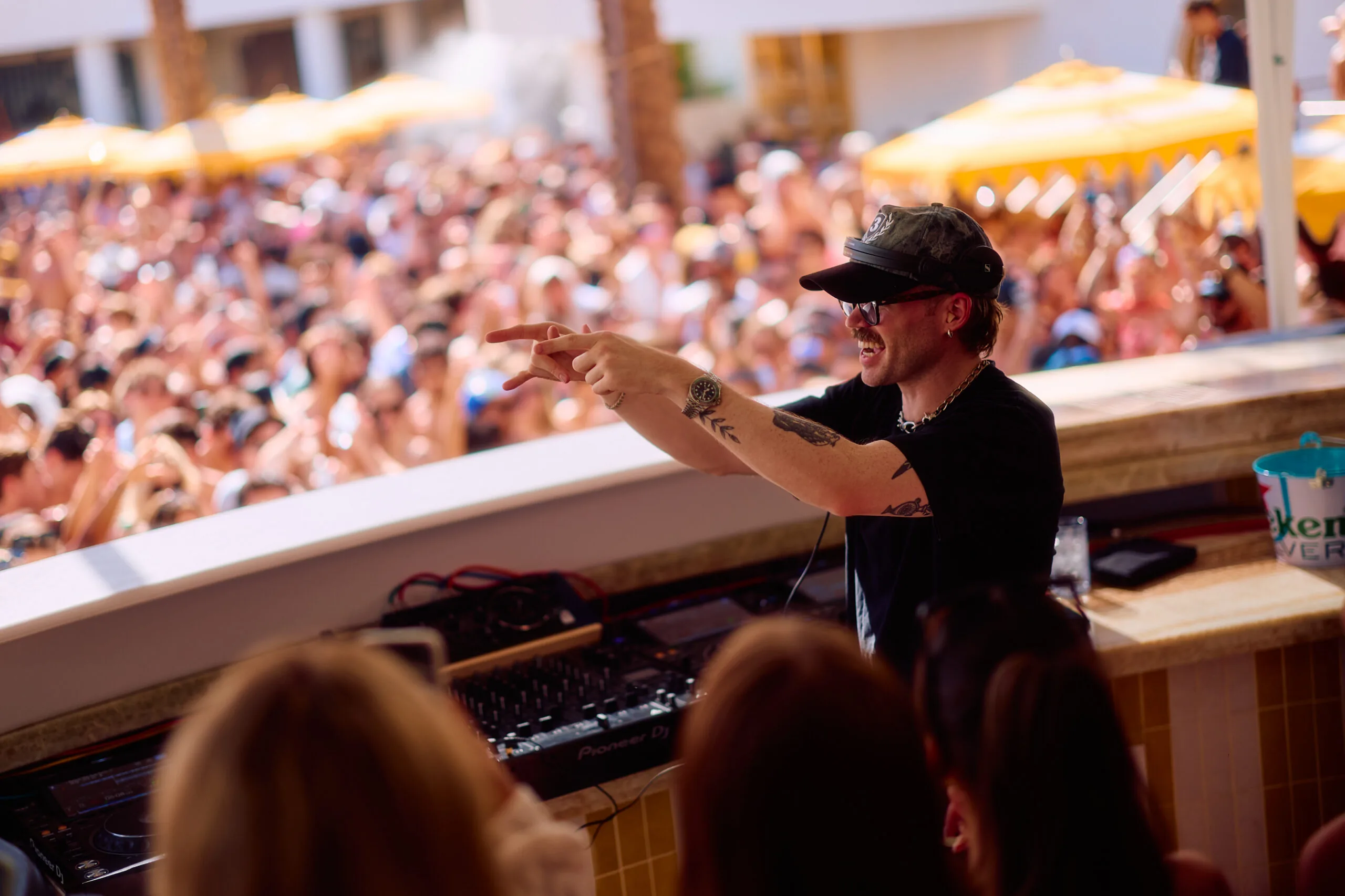 Dom Dolla performing at the LIV Beach dayclub DJ booth in Las Vegas